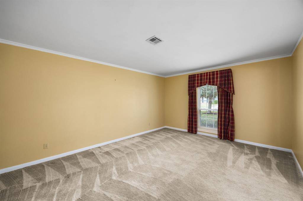 Living room overlooks front yard
