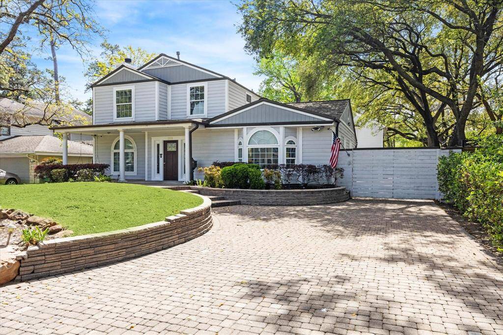 Another view of this beauty sitting on a 12,000+ square foot lot.