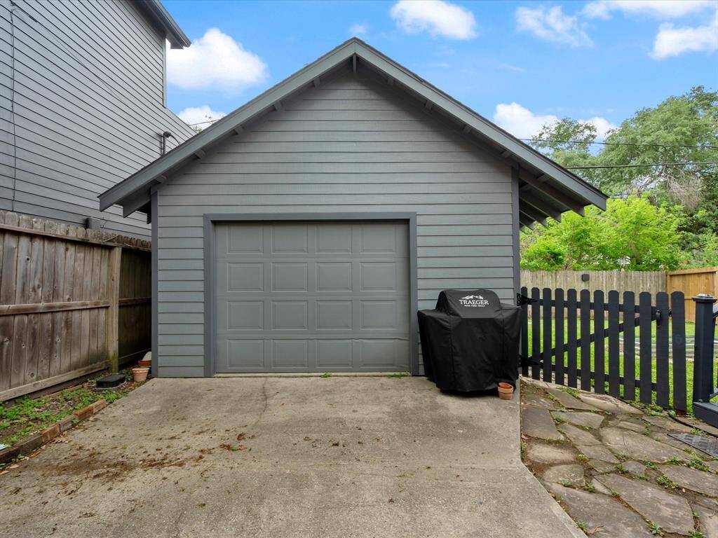 Oversize one car garage includes Electric Vehicle outlet.