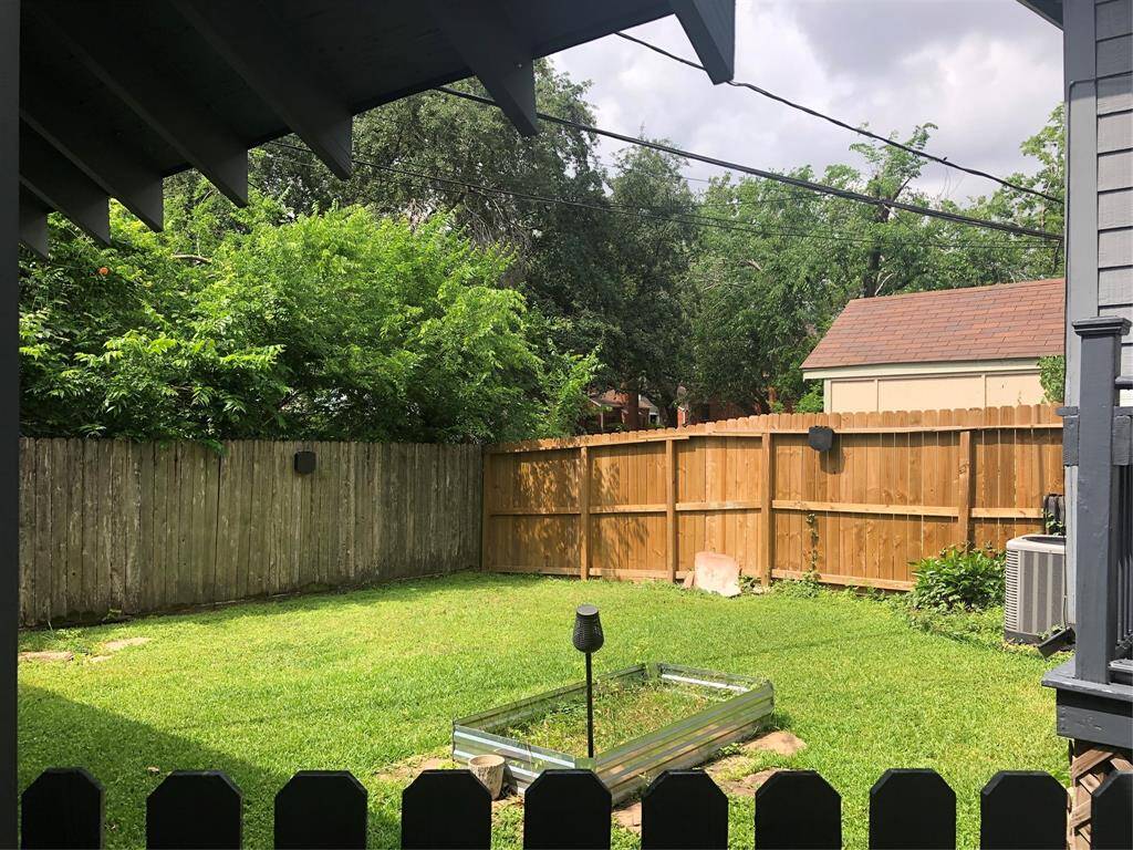 Nice Backyard with view of trees.