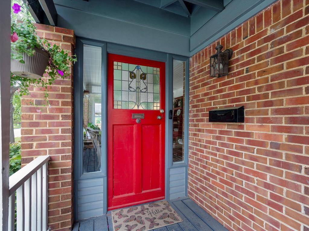 Original stain glass front door and mail slot.