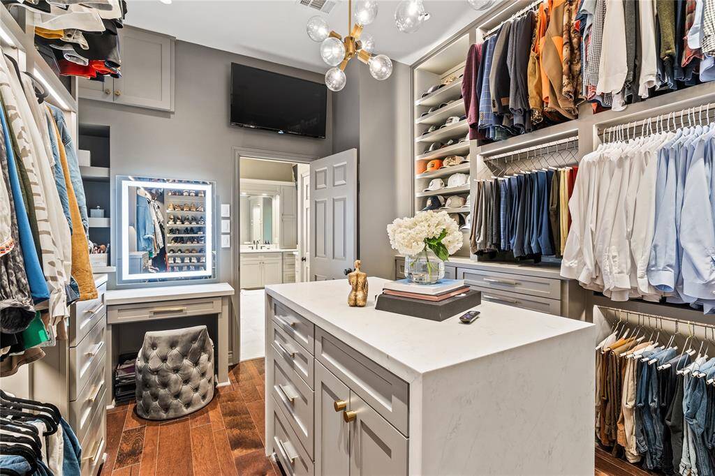 Primary closet you might think you are in a department store.