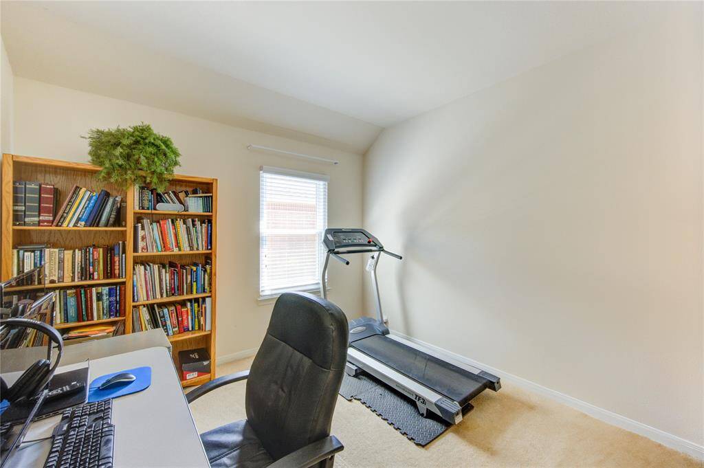 This secondary bedroom number 3 offers a charming angled ceiling, plush carpeting, and beautiful natural light. Either of the secondary bedrooms could be flexibla such as another office/study, space for working out, reading room, etc.