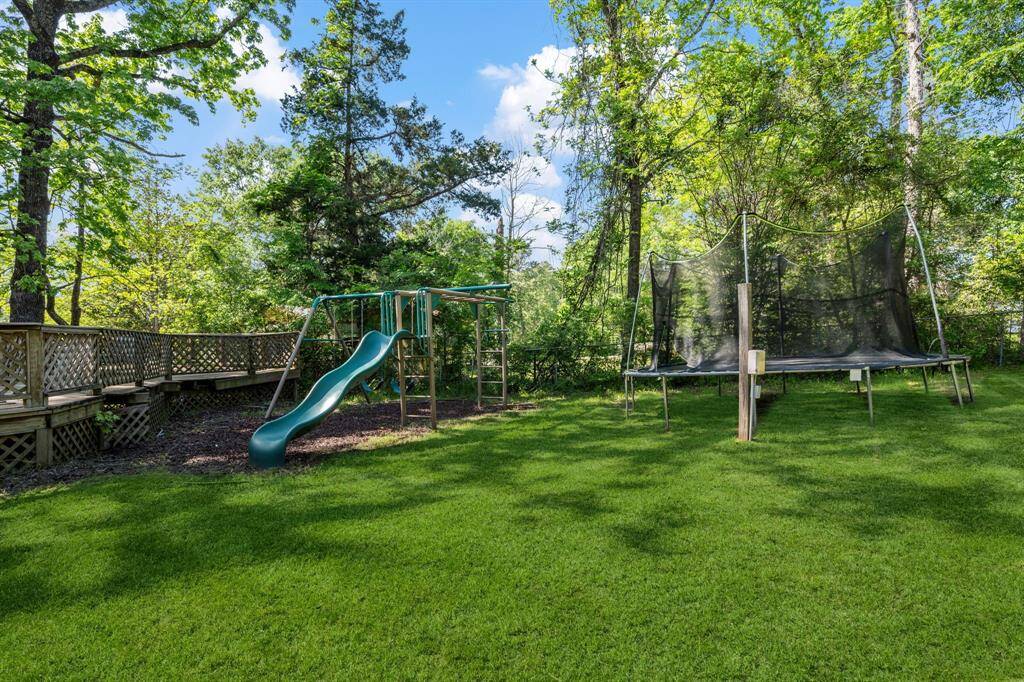 Coming down from the porch you have a great sized and fully fenced in back yard. This backyard is great for entertaining and provides loads of space for kids or furry friends to roam.