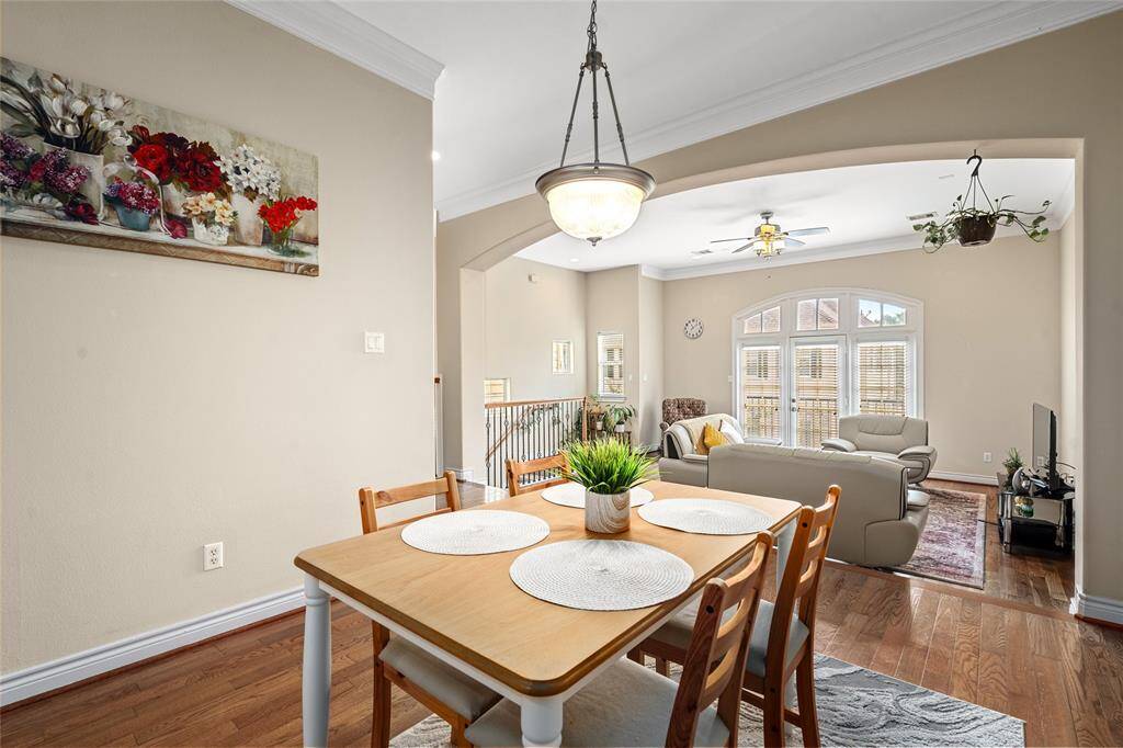 Nestled between the kitchen and living room, the dining area is spacious enough for a full-size table, creating a seamless connection between both spaces and making entertaining or family meals effortless.