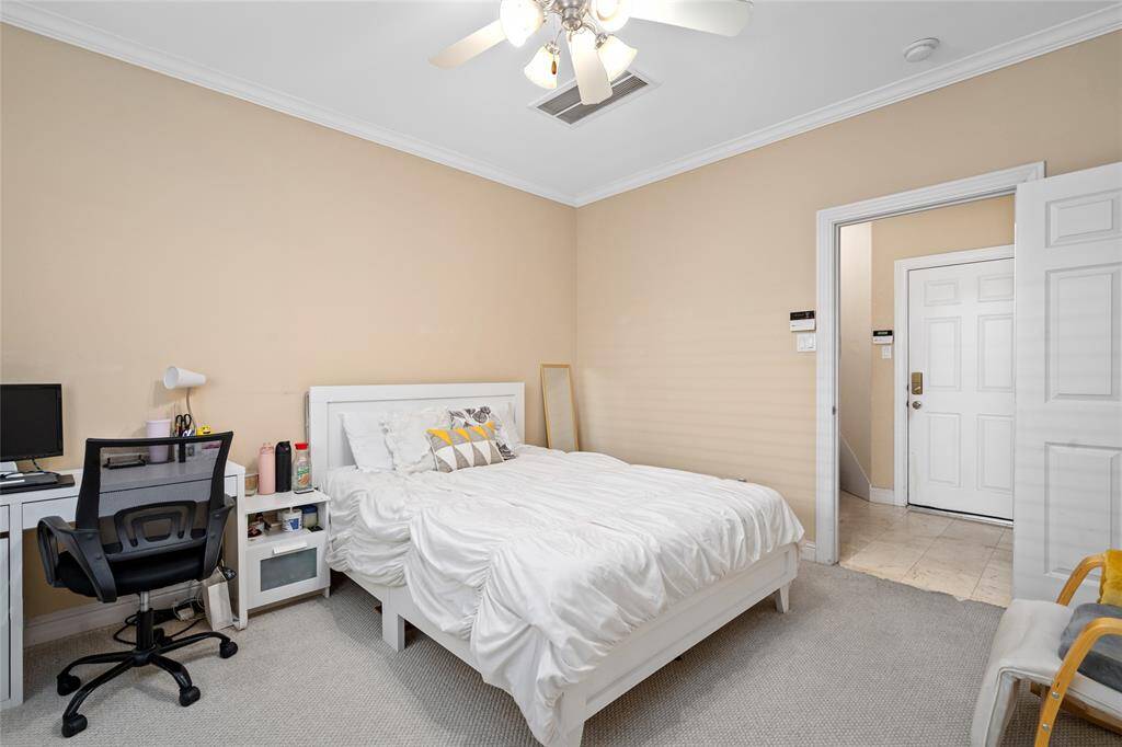Comfortable and private, the primary suite offers a spacious layout with soft natural light. Plenty of room for a king-sized bed and additional furniture, with easy access to the en-suite bath.