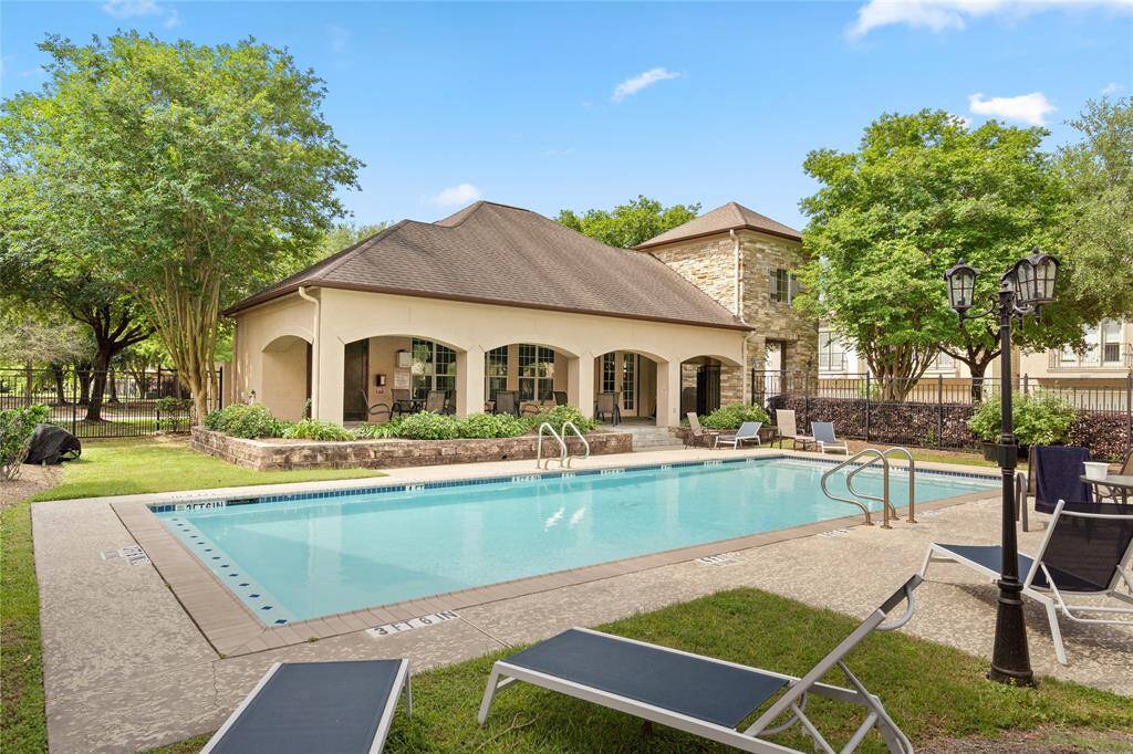 Enjoy access to the community pool, a refreshing spot surrounded by well-maintained landscaping. The spacious area provides a perfect place for relaxation, swimming, or socializing with neighbors in a peaceful, inviting atmosphere