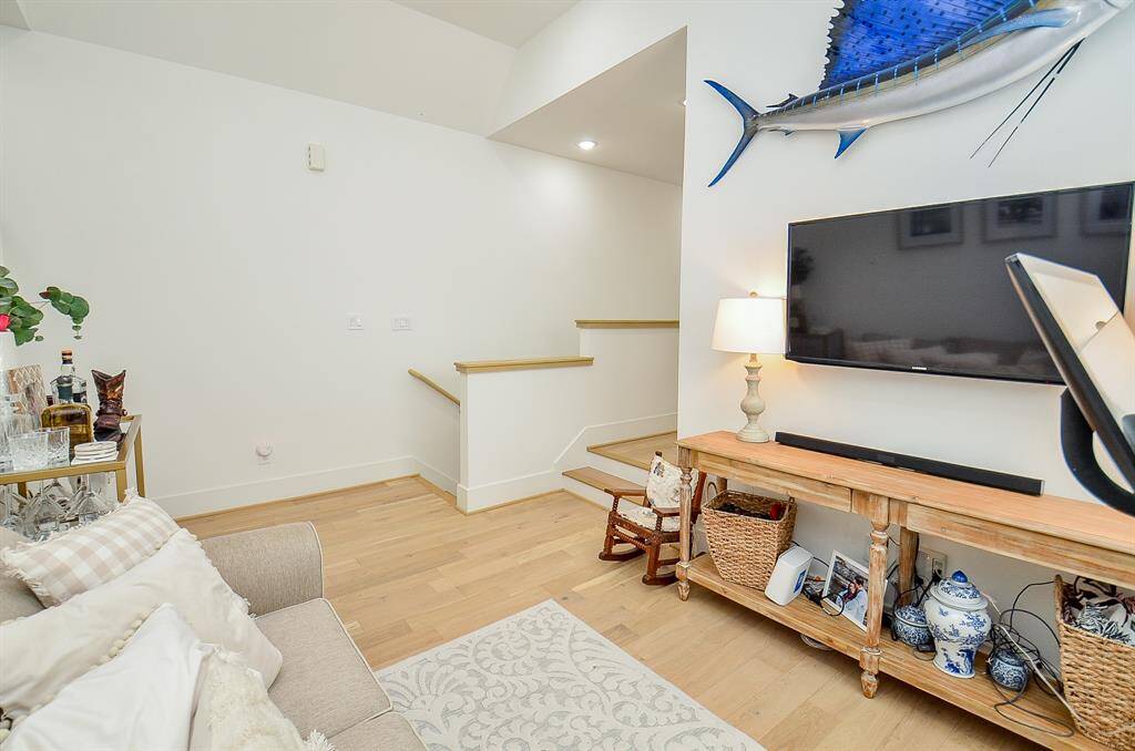 Flex space at the top of the stairs can be another living area, exercise area, or a home office space.