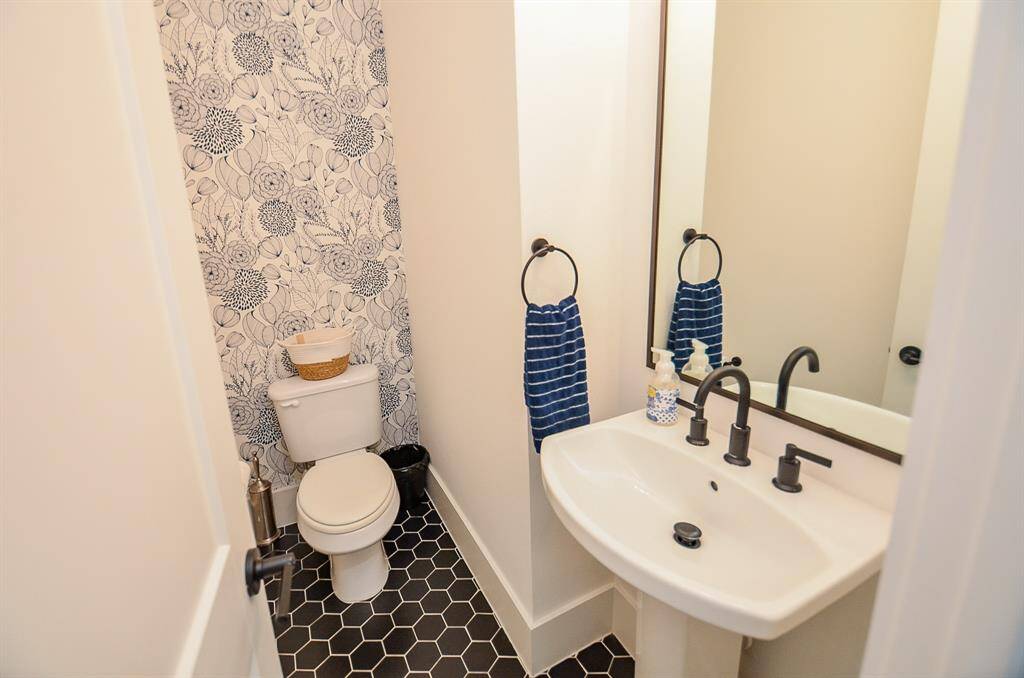 Downstairs: Half bath off the kitchen