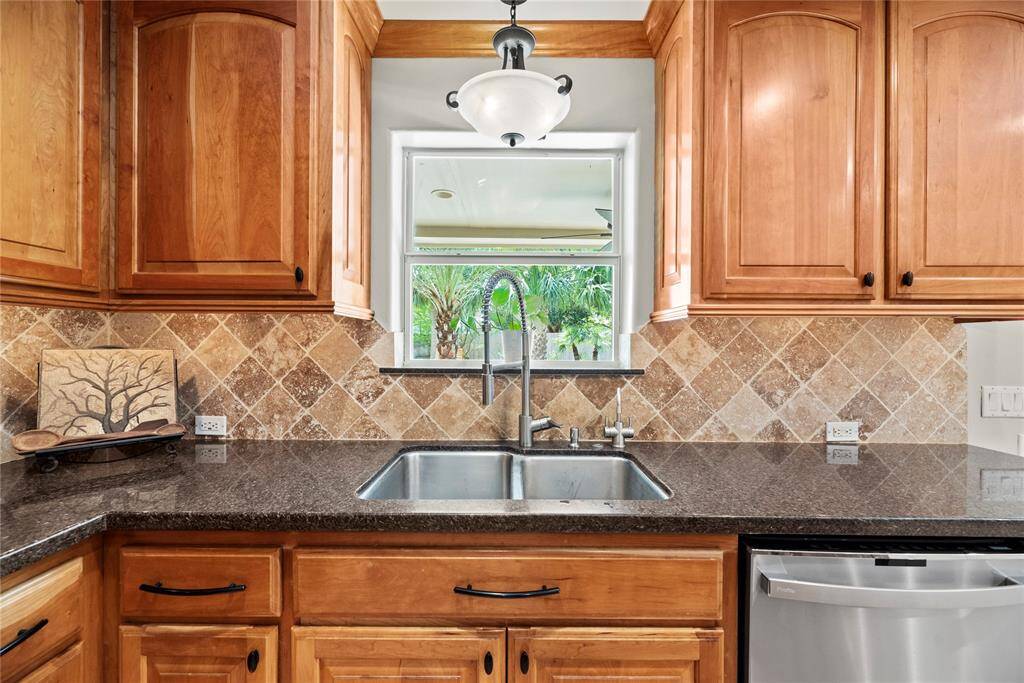 Double stainless-steel sinks make cleaning produce and meal preparation much easier.