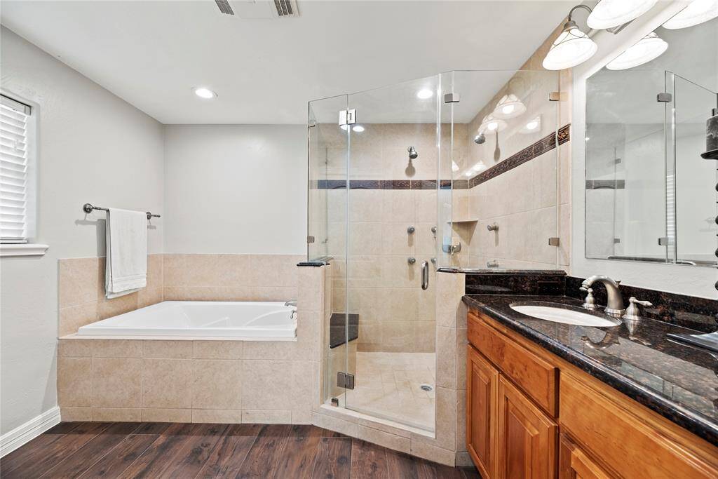 Every primary bedroom needs an en suite with class and sophistication!
