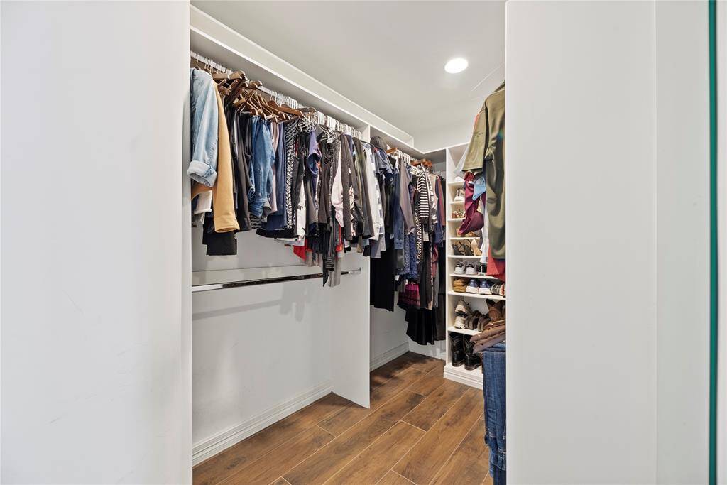 No matter how often you purchase new threads online or at the mall, this walk-in master bedroom closet has space for all your new and favorite wares!
