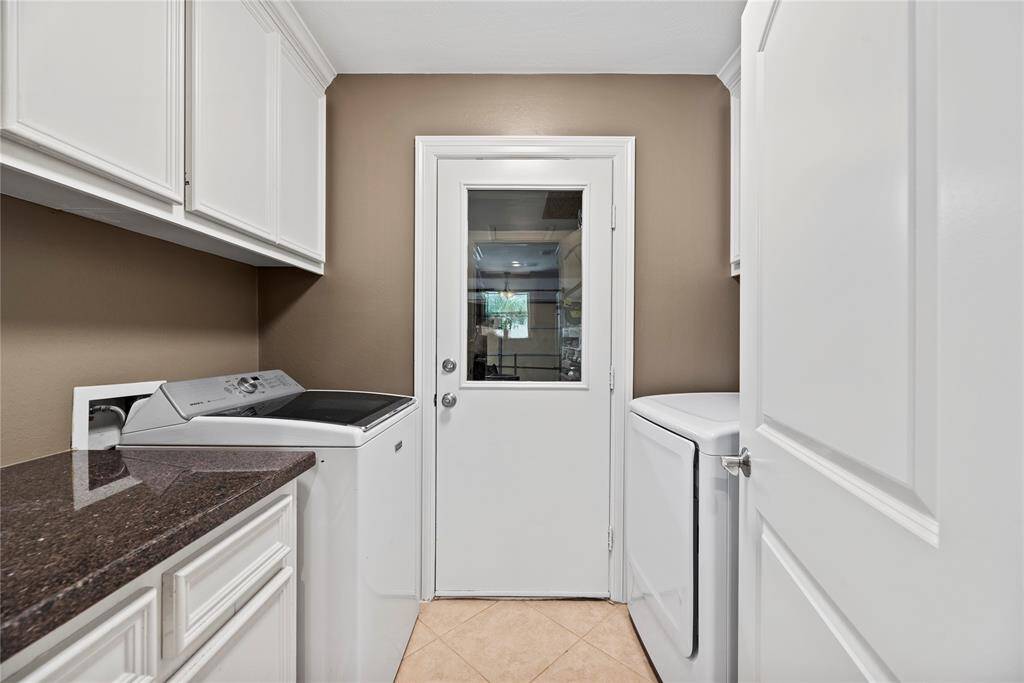 Laundry may be an ongoing chore, but in this home, it will be an easy and fun one!