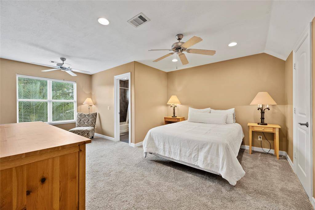 Convenient for in-laws, extended-stay guests, teenagers or adult children, the guest suite features neutral styling and an attached full bathroom.