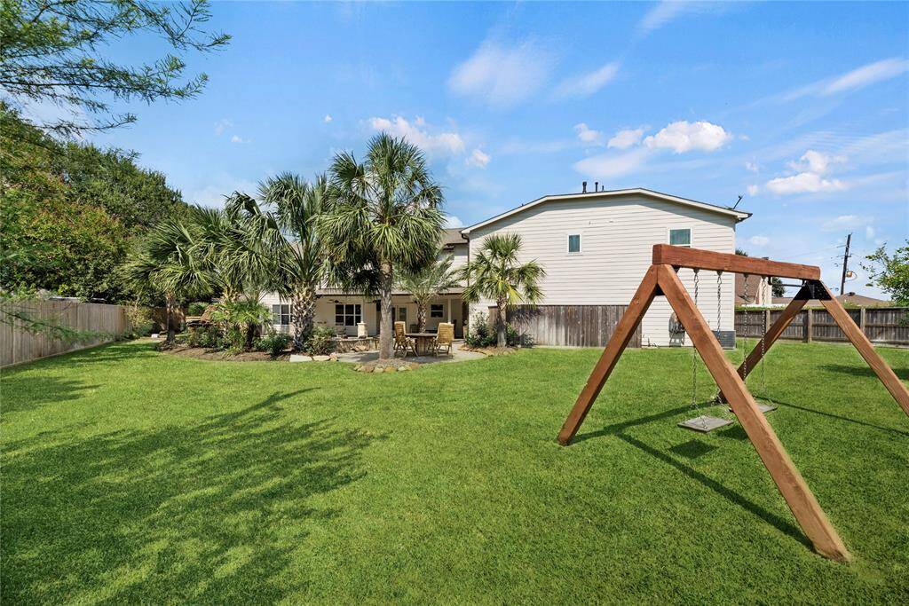 Let your imagination run wild with the immense possibilities in this expansive greenspace.