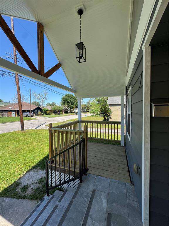 Cute front porch perfect for a little bistro table or a set of chairs.