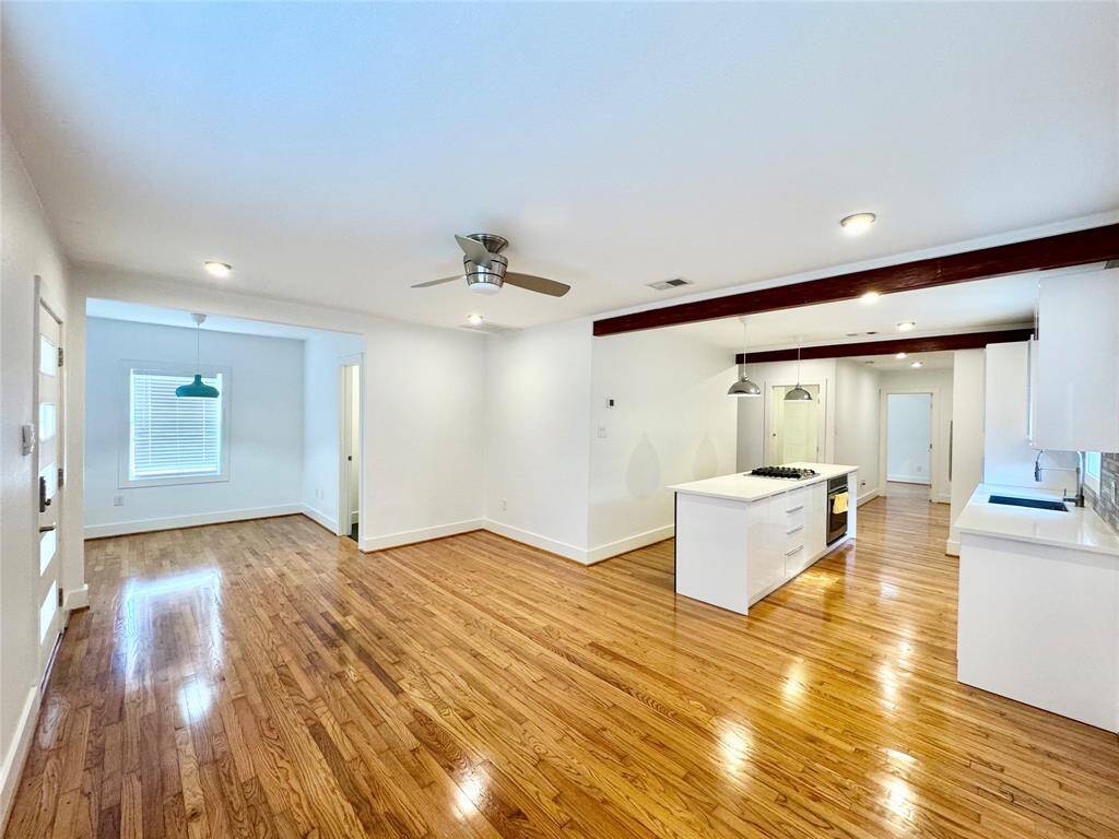 Spacious open flow plan! Gorgeous wood floors gleam!