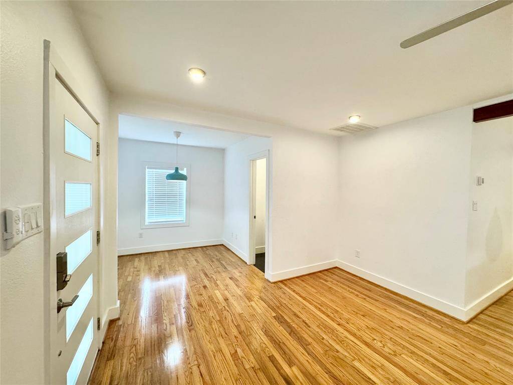 Niche area next to entry perfect for a small "formal" dining or just a home office alcove!