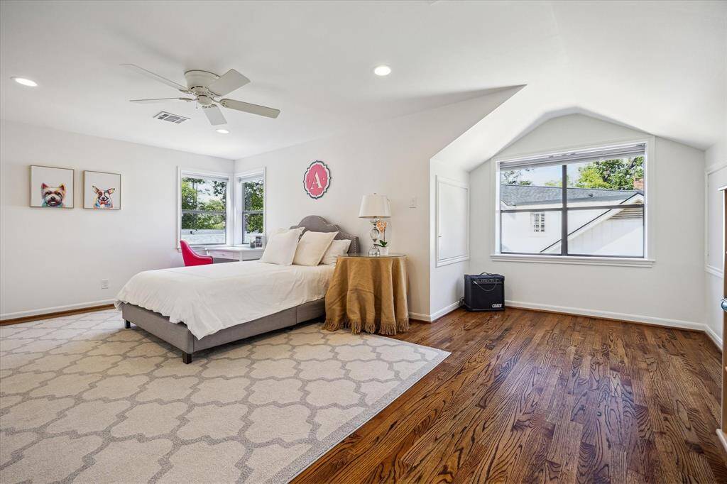 Secondary bedroom #3 offers a spacious layout with areas for lounging, studying, or relaxing. A private ensuite bath and walk-in closet enhance the luxurious feel. Natural light and smart storage complete this elevated retreat.
