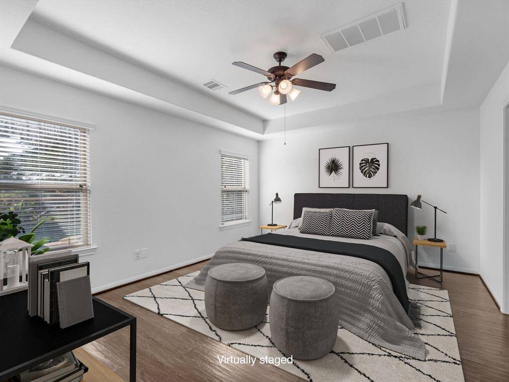 In true split floorplan fashion, the primary bedroom is located away from the secondaries.