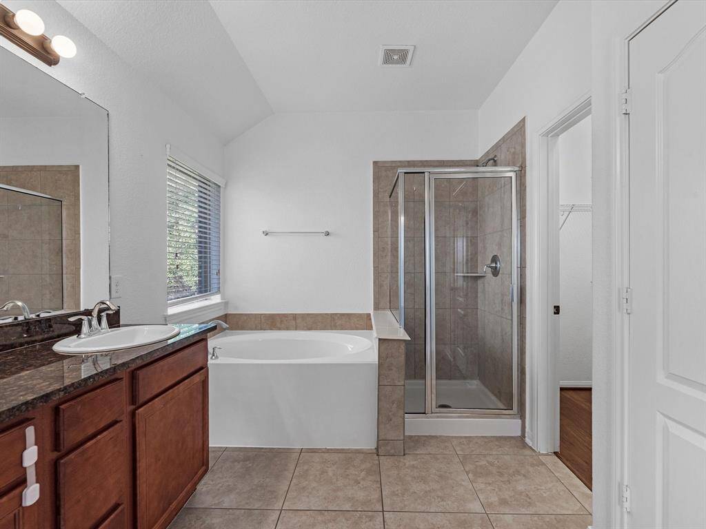 Two closets, a linen closet, and a water closet round out this space.
