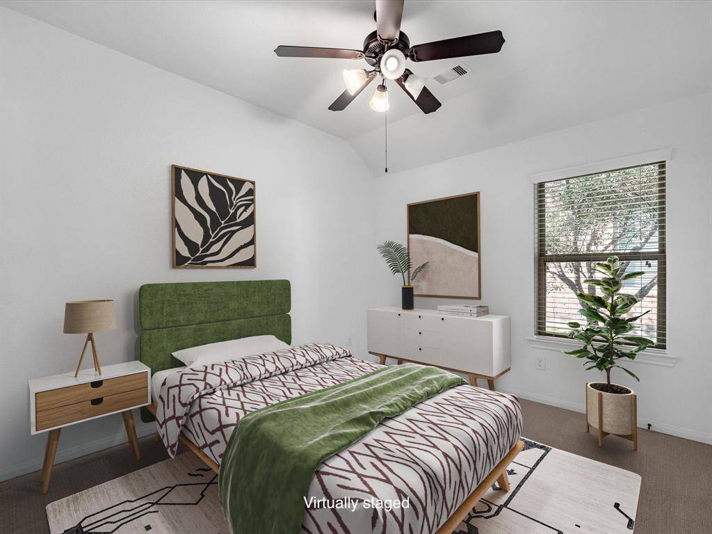 One of the two downstairs secondary bedrooms.