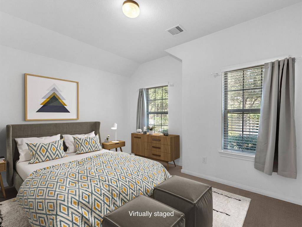 The 2nd downstairs secondary bedroom. This bedroom is located at the front of the house.