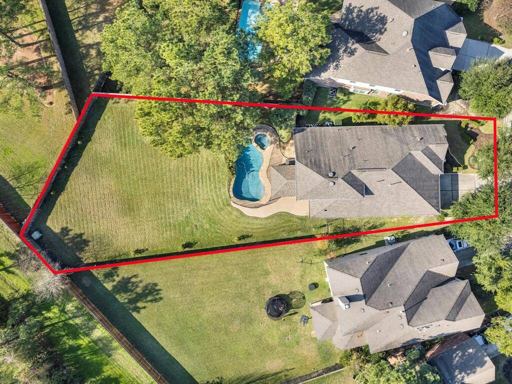 An aerial view of the massive 13,842 SF lot.