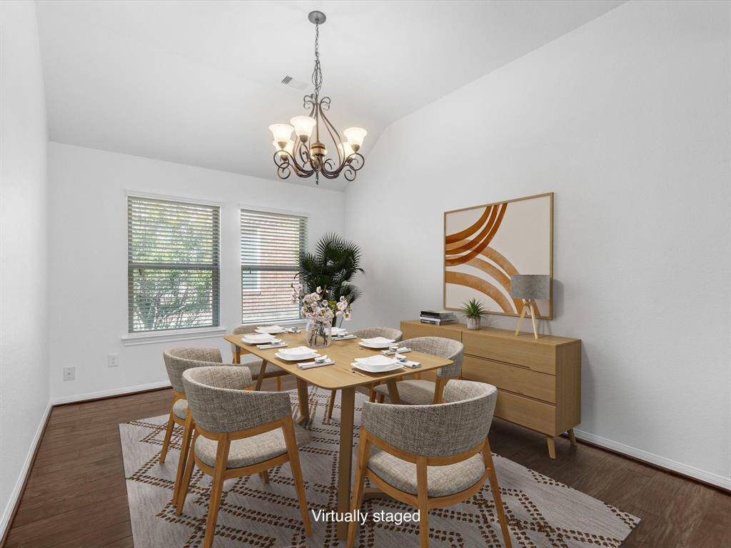 A defined dining room is open to the living area.