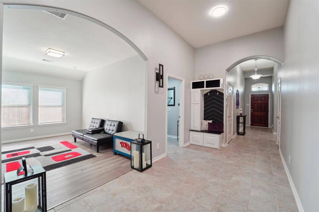 Foyer view with gameroom/dining room pictured!