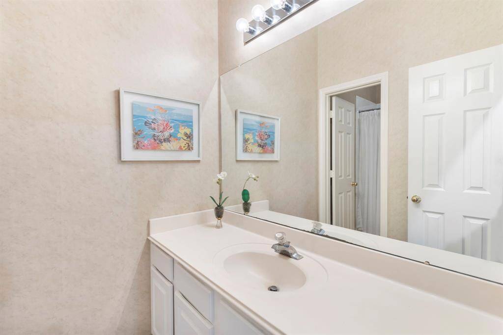 Three secondary bedrooms share a bathroom.