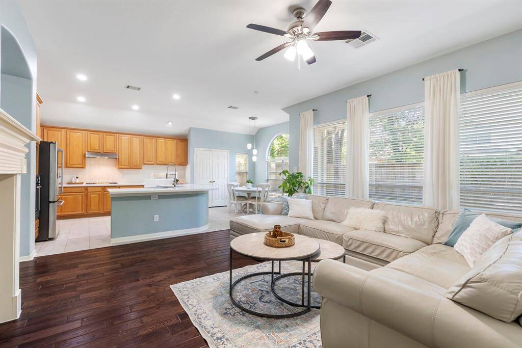 The family room overlooks the kitchen and the breakfast room.