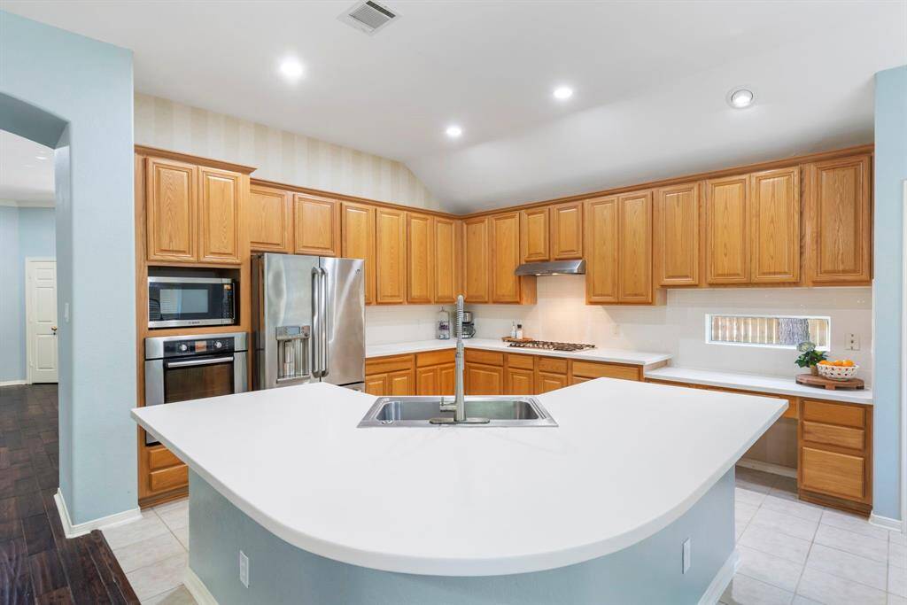 The kitchen has lots of cabinet space!