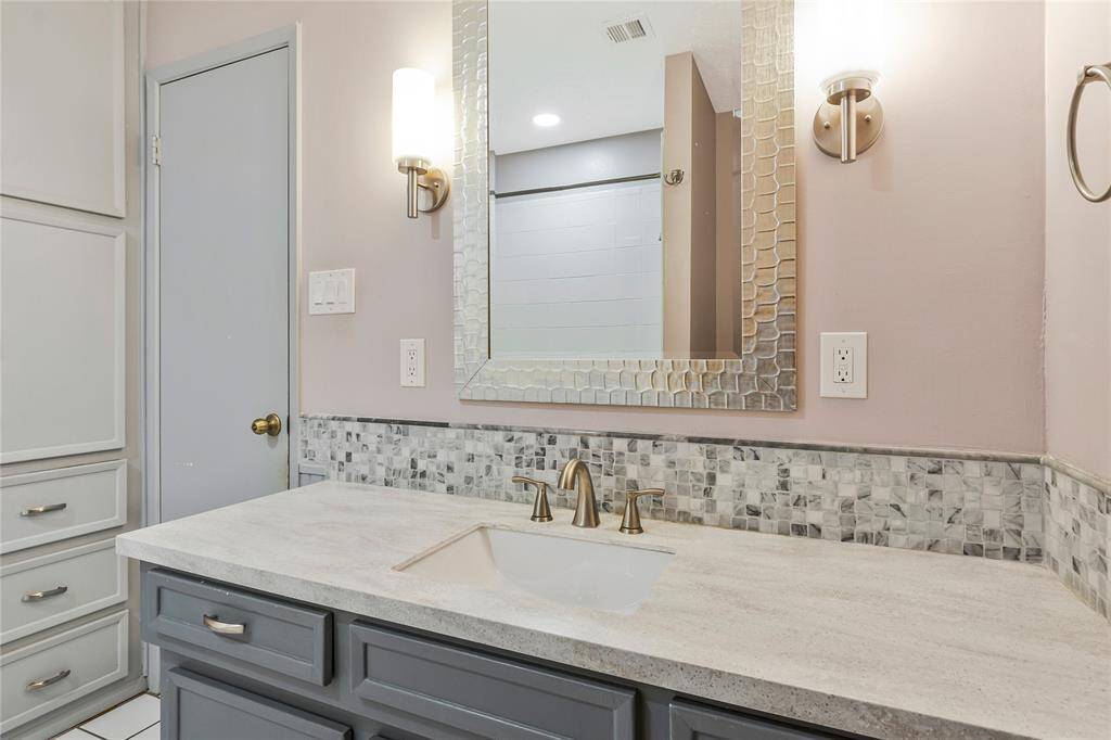 FASHIONABLY REMODELED HALL BATH!