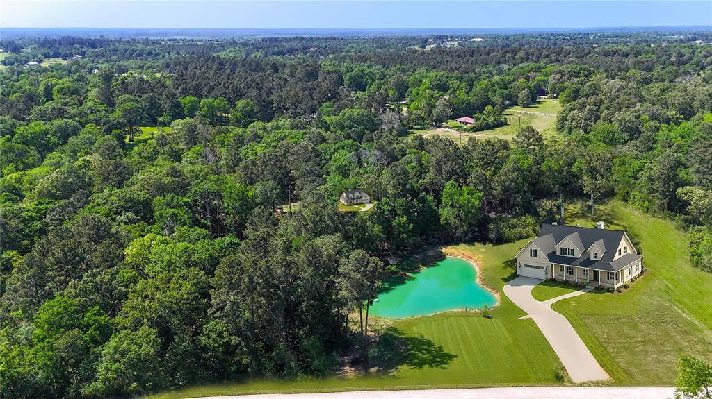 Rendering is for visual representation purposes only. The property for sale consists of 2.6 acres with stocked pond. The home shown is not included in the sale and is only intended to illustrate what could potentially be built on the site.