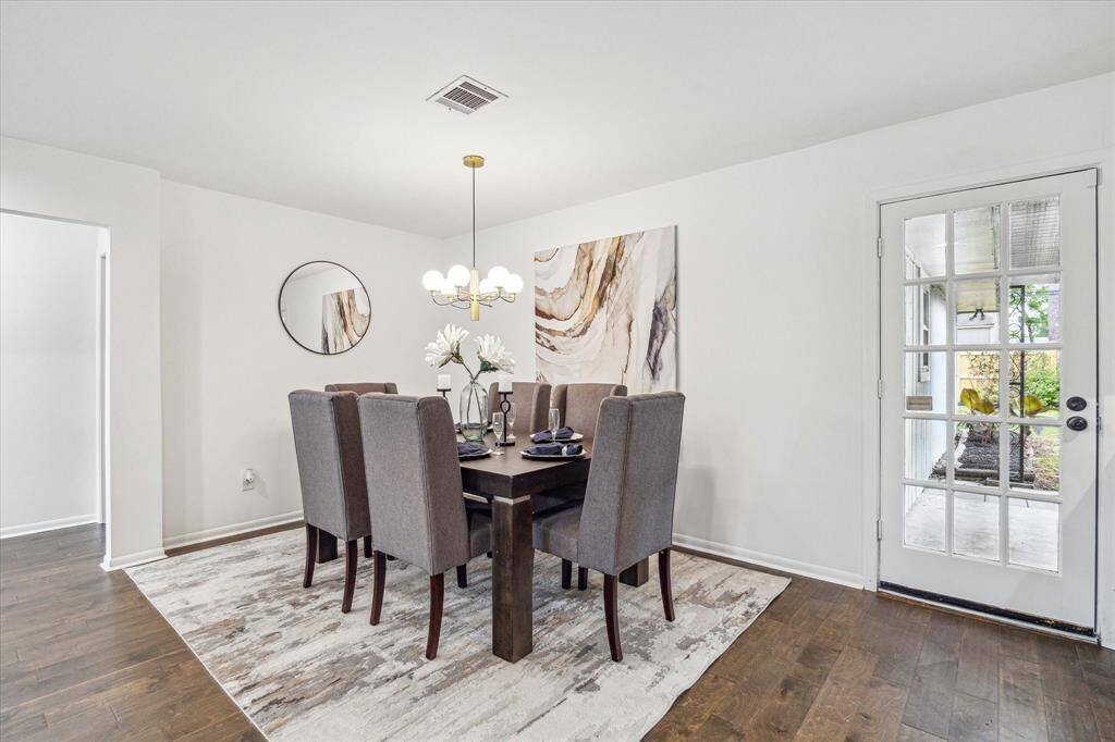 Patio door opens up off of kitchen and dining area for east of entertaining.