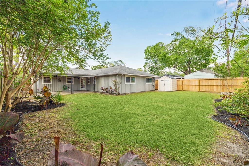 Large backyard, plenty of space for a pool, garden, or whatever you desire! Storage shed only a few years old, in great condition and conveys with sale of home.