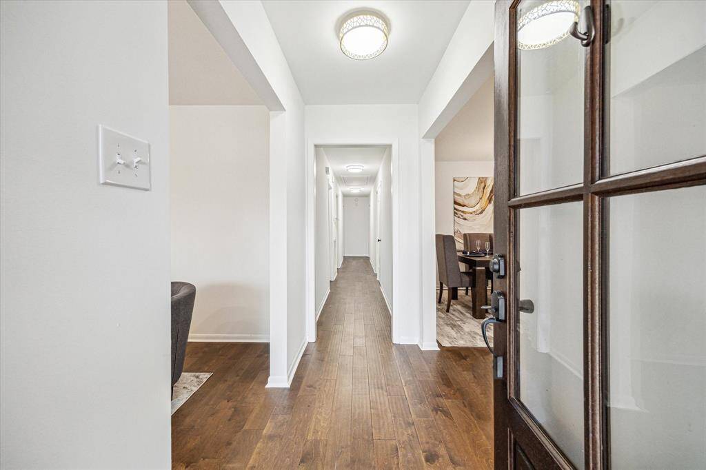 Foyer entry with a study/flex space to the left as you walk in. Freshly stained front door greets you upon entering.
