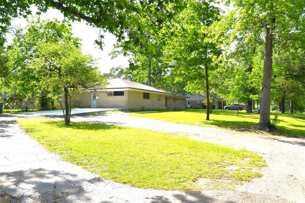 Circle driveway with extra parking space as well as a double wide driveway!