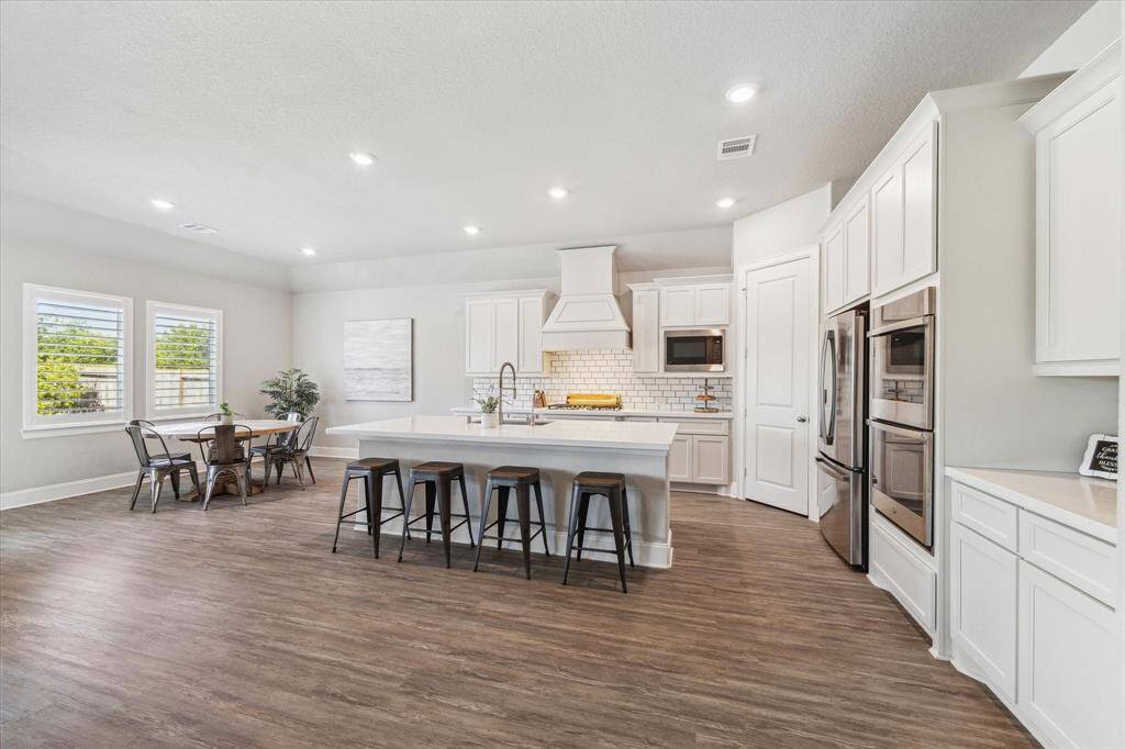 The upgraded kitchen features are sure to impress.  Pleanty of countertop space and cabinets.