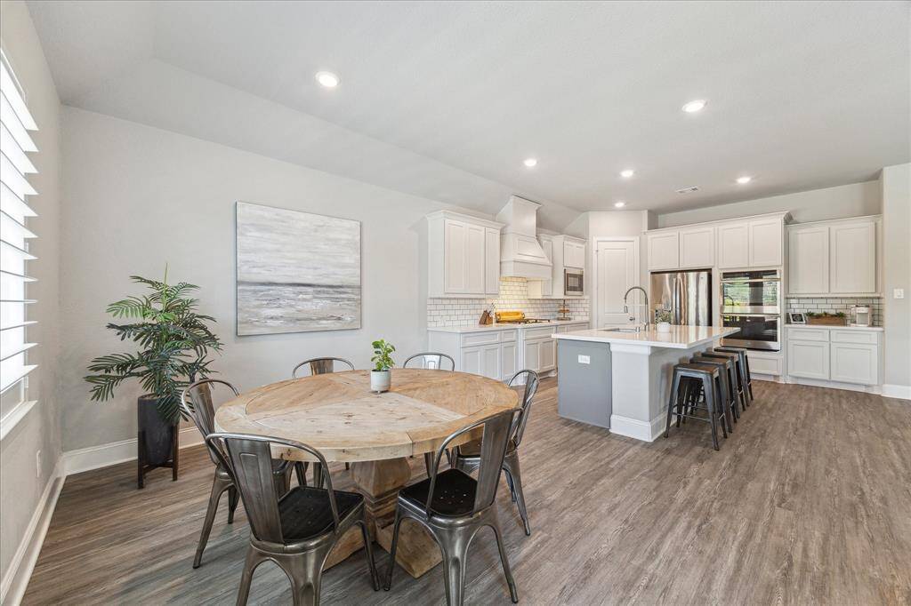 Plenty of room for people to sit to dine in this home.