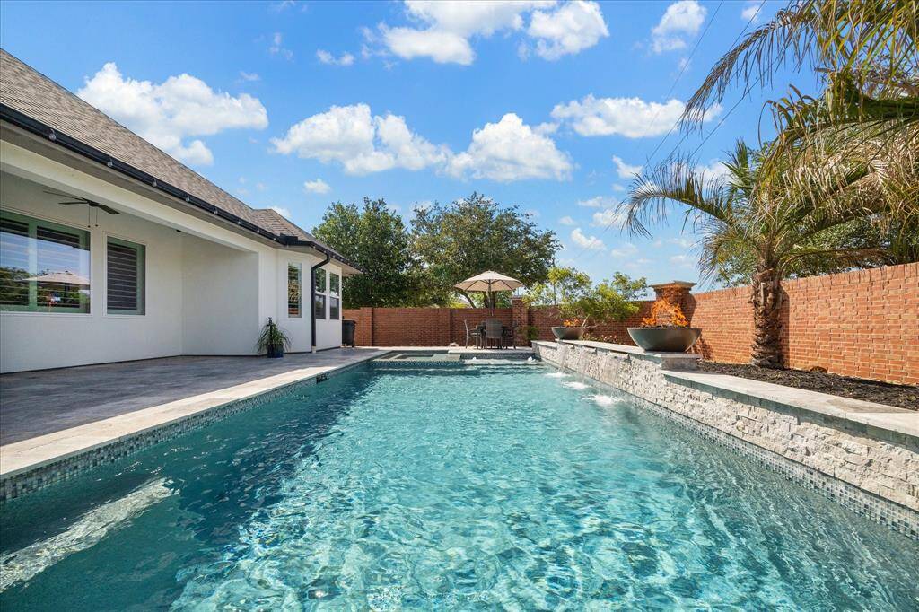 This home only has neighbors on one side true tranquility while enjoying your backyard.
