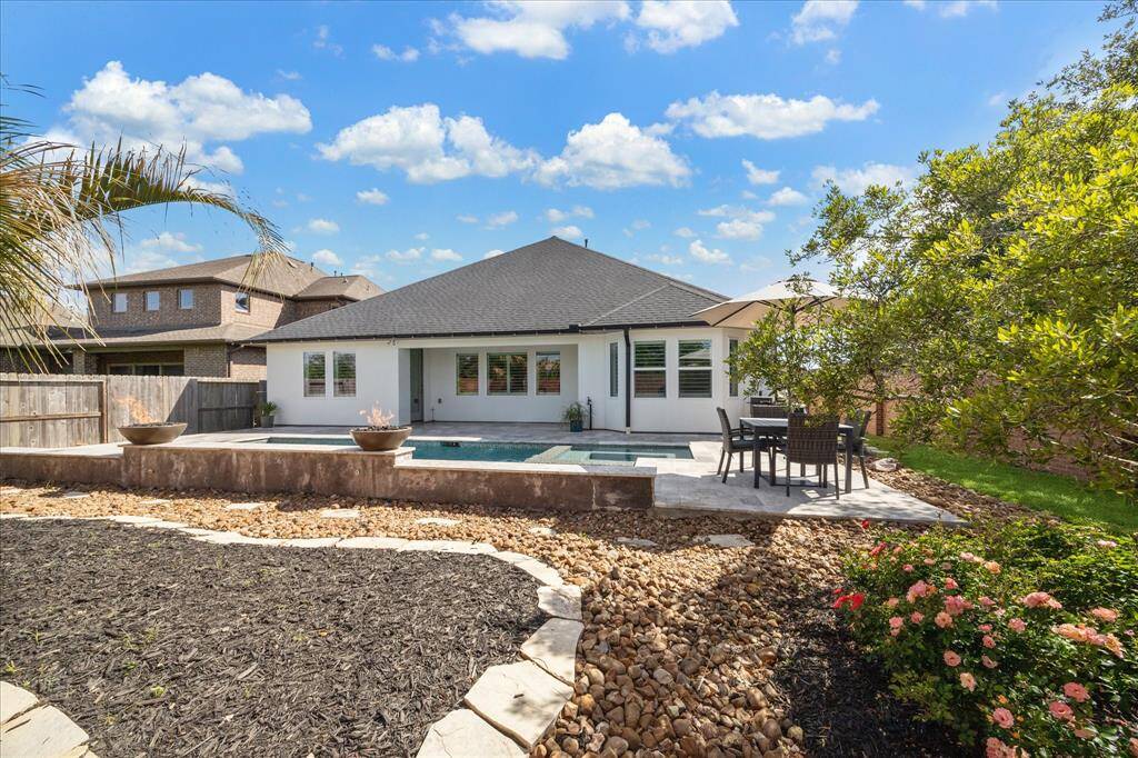 The landscaping is so pretty at this home.  Schedule your appoitment today to see all the beauty that 10203 Wylde Pointe Lane has to offer.