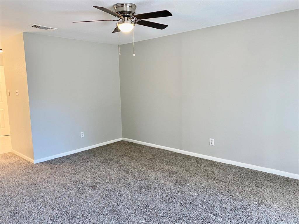 Master Bedroom- Old picture: Carpet has been replaced with LVT...no carpet in the house now.
