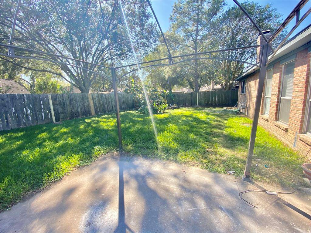 Back patio and yard- Old pic: The metal structure has been removed
