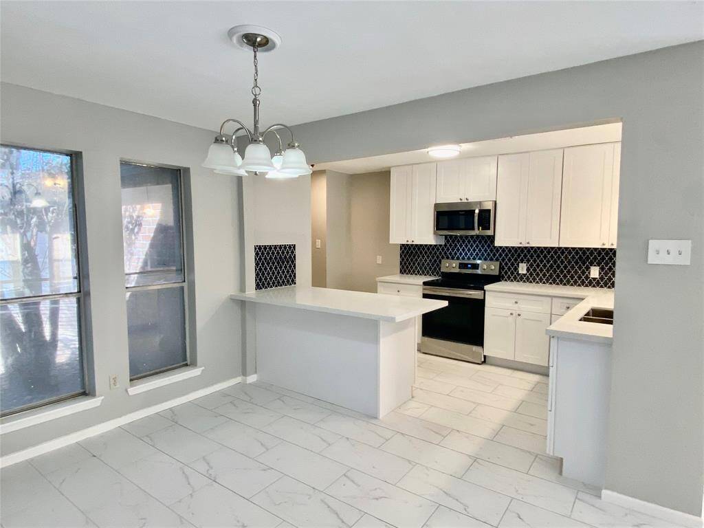 Formal dining and kitchen