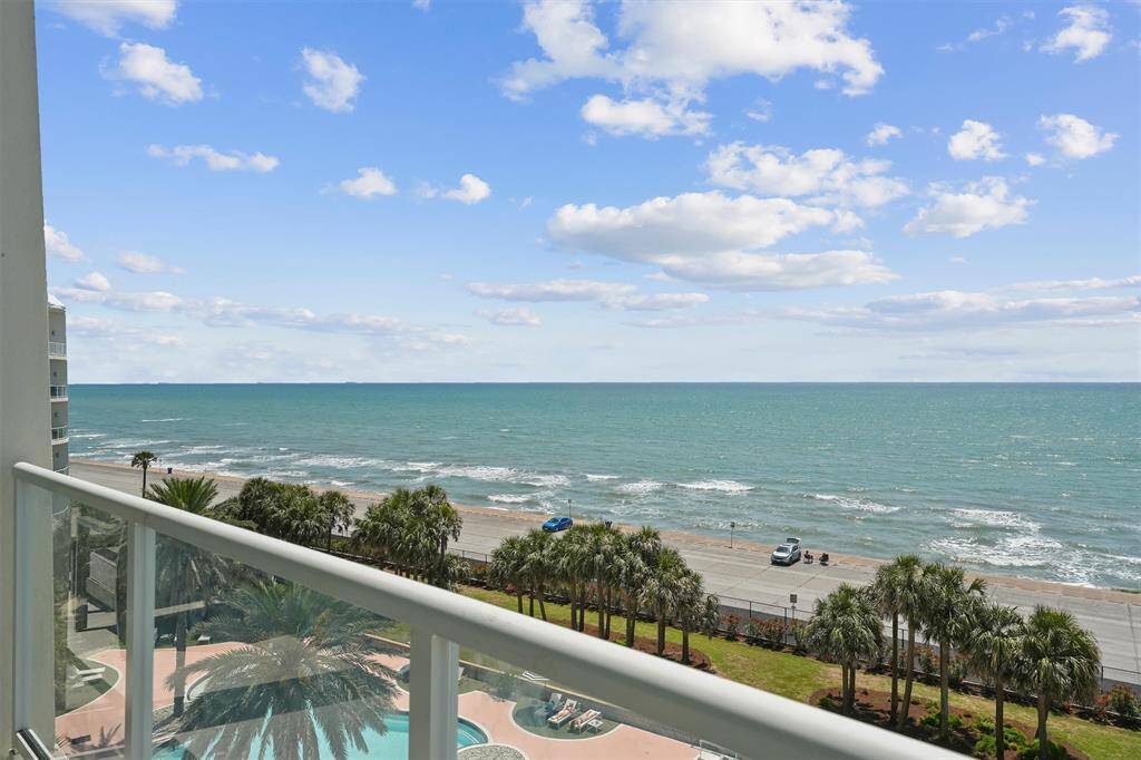 Spacious private balcony with panoramic Gulf views—perfect for morning coffee, watching pelicans fly by, or enjoying the coastal breeze.
