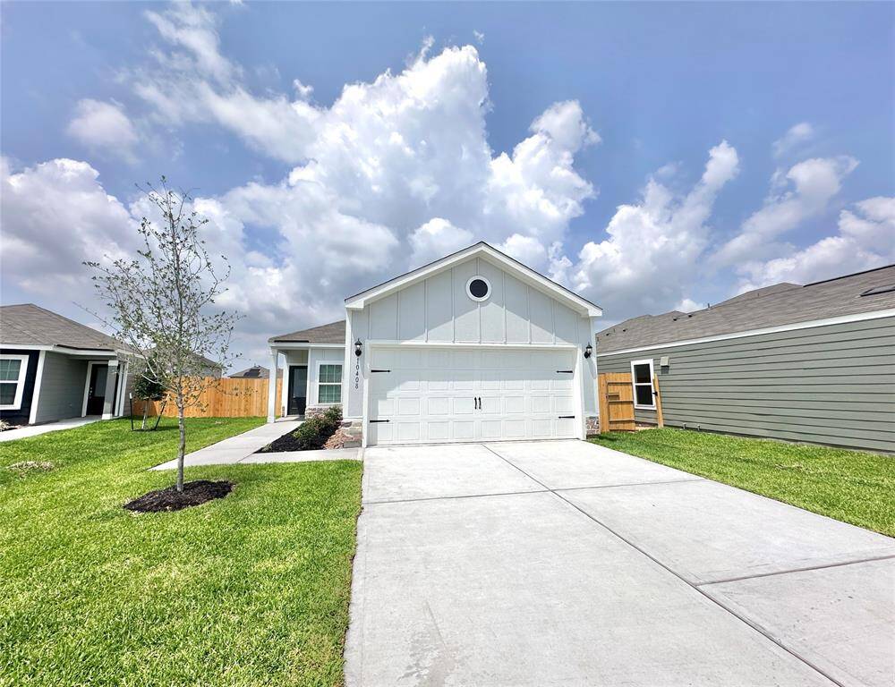 This one-story home features an exterior design that is both charming and durable.