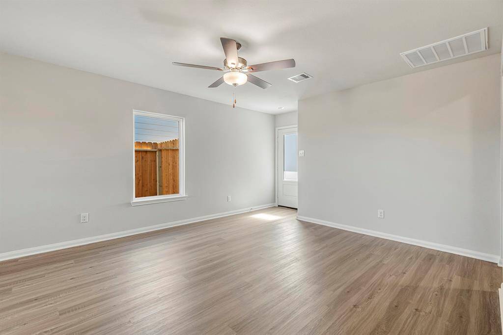 Check out the spacious living room and upgraded flooring!