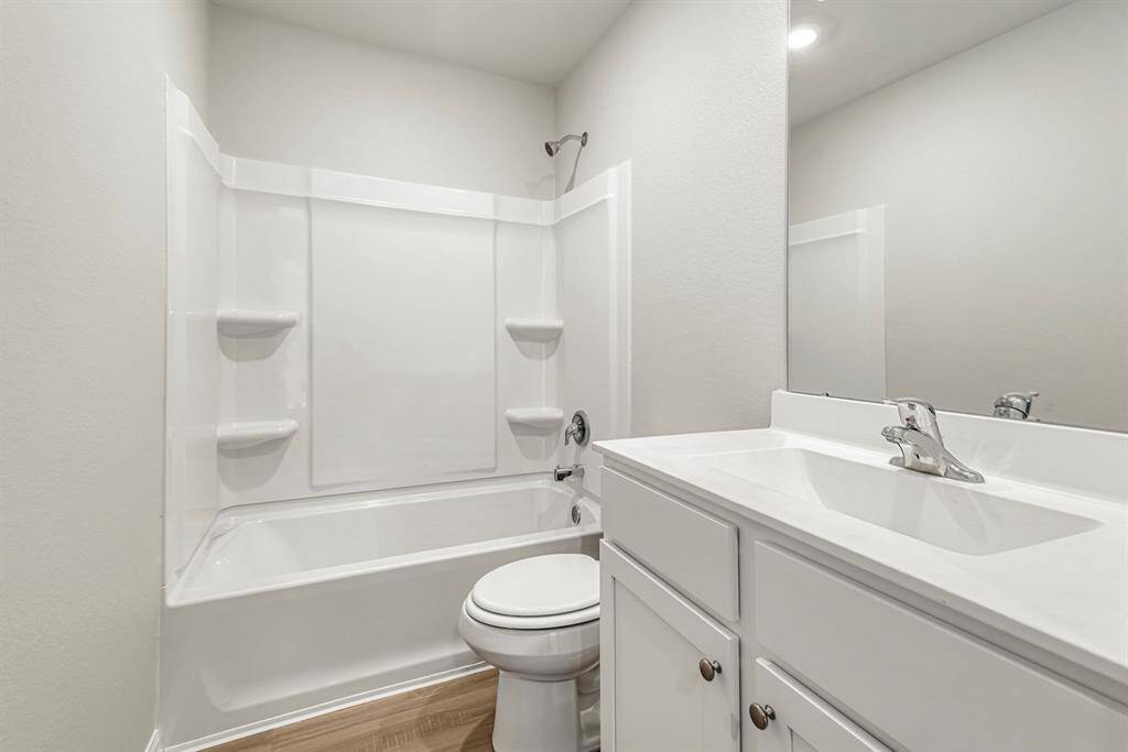 The guest bathroom has a full shower/bath combination as well.
